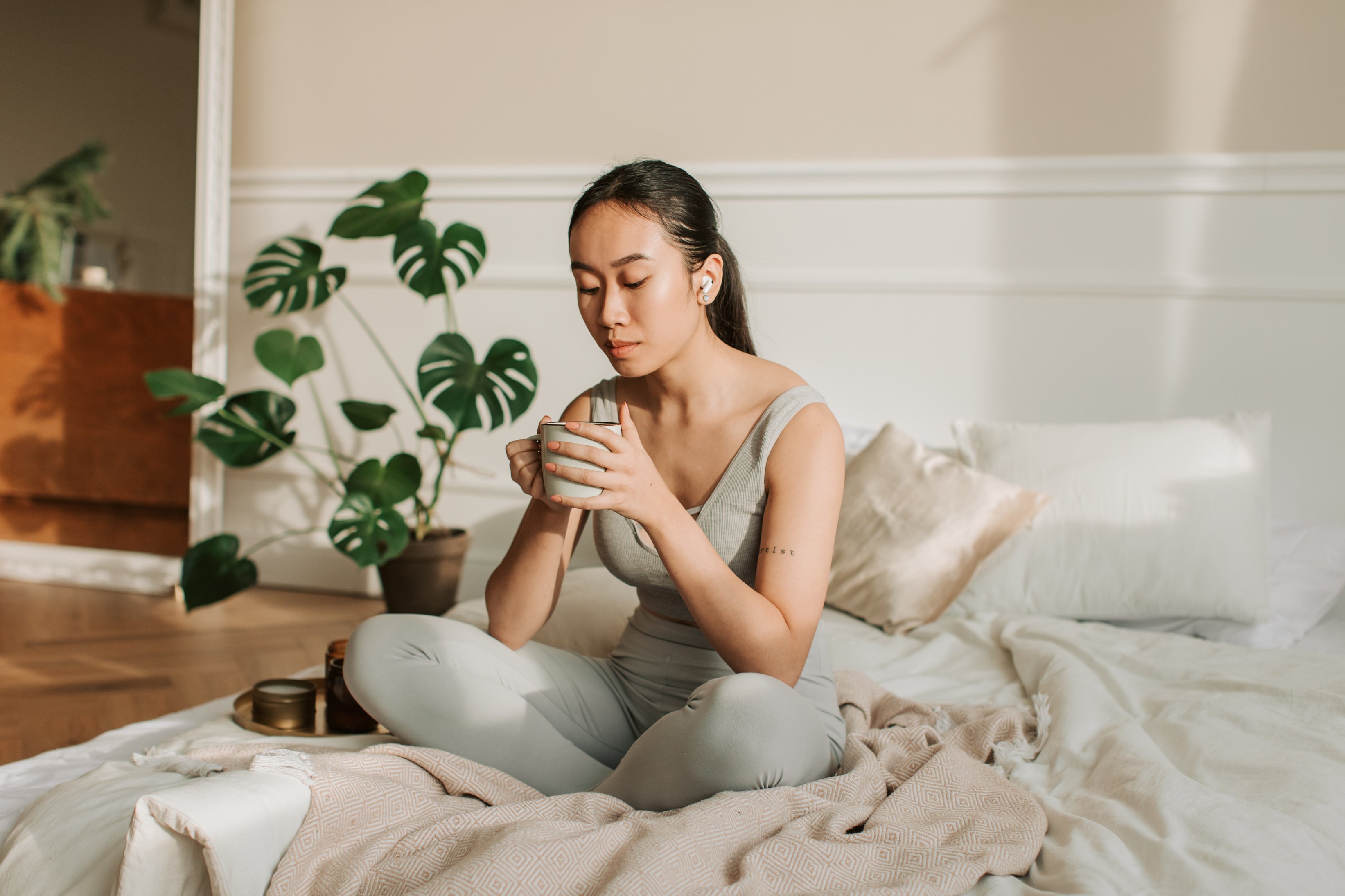 Woman Drinking a Cup of Tea